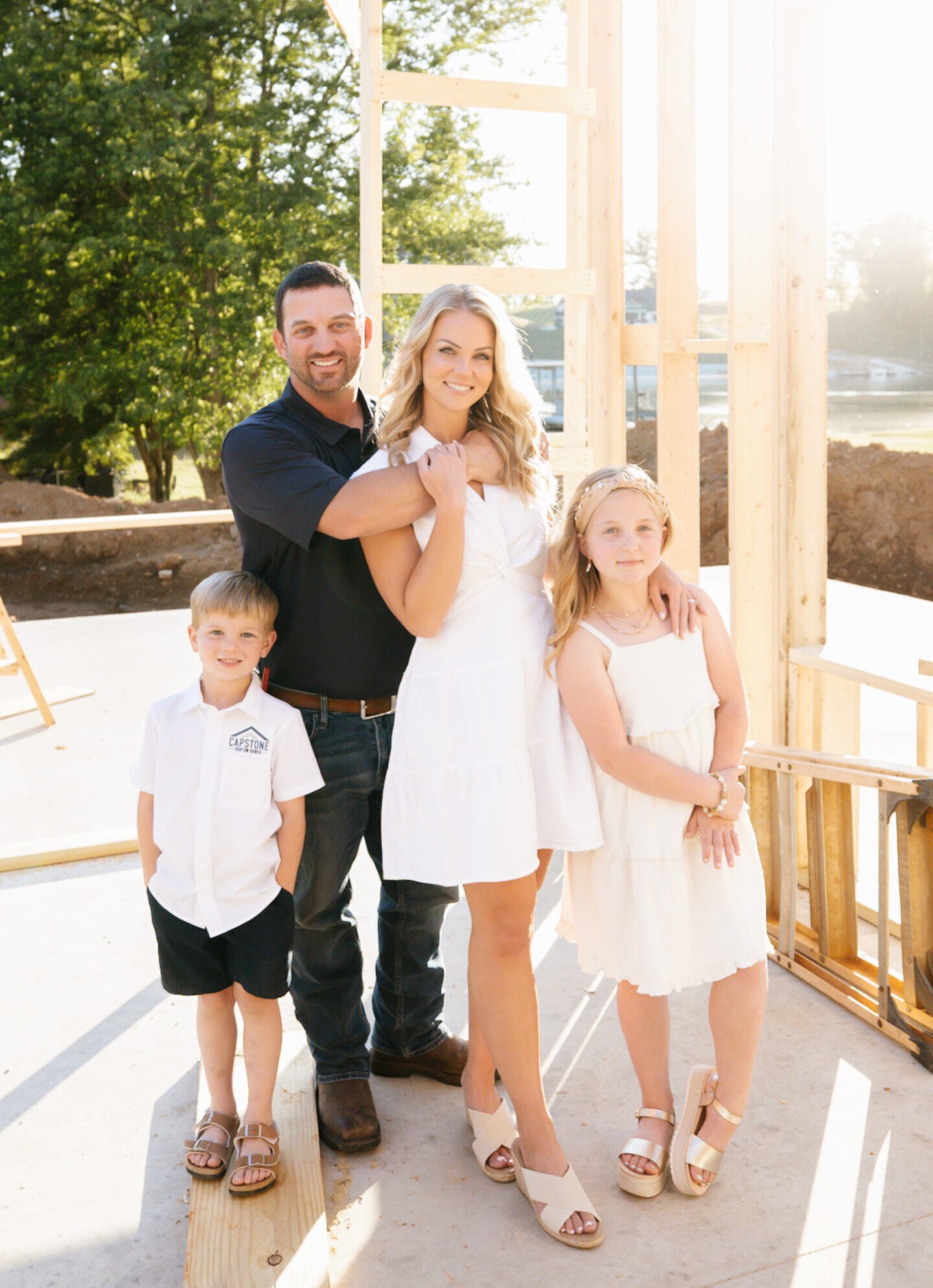 Family photo representing the team behind Capstone Custom Homes in North Alabama.